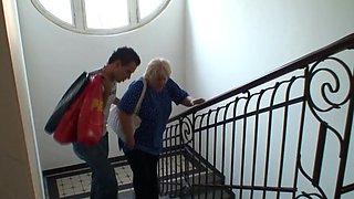 Busty blonde granny is riding the dick of the older man