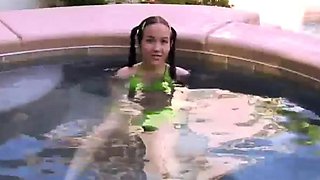 Tiny Tabby Masturbating at pool