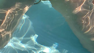 Naughty wife in the pool showing off