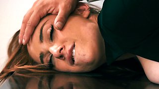 Curvy redhead masseuse Kira Fox gets eaten out and fucked on her desk