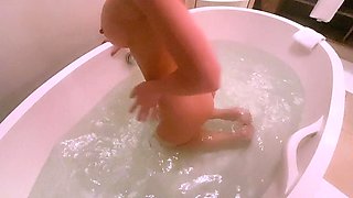 Hot babe with perfect big boobs taking shower