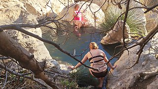 Cute sissy Wet Bibe enjoys a romantic bath in steaming springs with her girlfriend