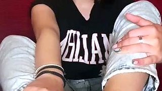 Cute teen girl enjoys foot fetish