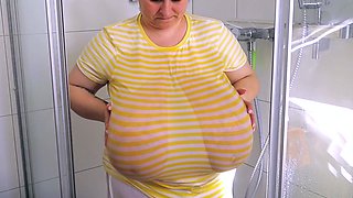 Busty curly brunette with big boobs fucks on couch