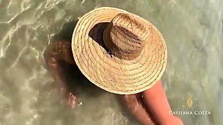 Cassiana Costa, a blonde Latina, pleasured a lucky guy on the beach, leading to an intense blowjob and a money shot in her mouth.