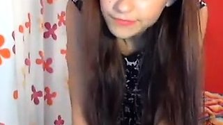 Small titted brunette teen fingering on the bed