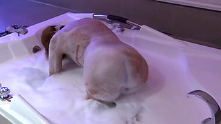 Before enjoying my boss's huge cock, I go to the motel's jacuzzi and start to get aroused.