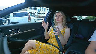 Blonde girl gets naughty in a solo car show