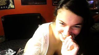 Beautiful teen fingers her cunt and teases with a big dildo