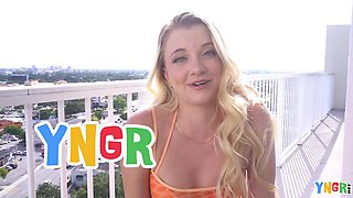 Blonde shows off pussy and tits outside before taking a fuck in bed