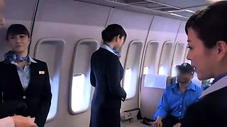 Alluring Asian stewardesses having fun with the passengers