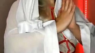 Amateur blonde vixen poses in white lingerie on webcam