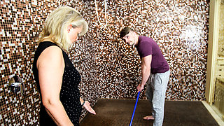 Blonde MILF sucks and milks young stud in shower room