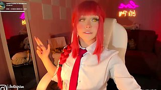 Redheaded pierced teen close up toy show