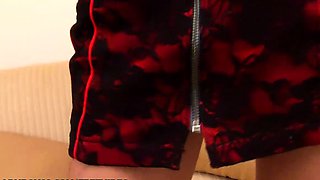 Skinny redhead ladyboy with big tits strips her black