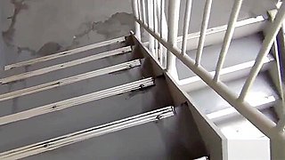 Asian slut peeing on stairway