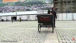 Naked babe pulling charios in public