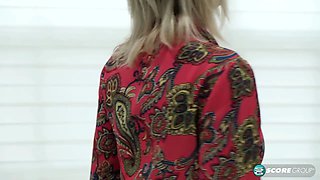 Big, fake tits and fingers deep in her shaved, 65-year-old pussy