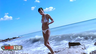 Canele: Arabian Removing Her Clothes by the Beach