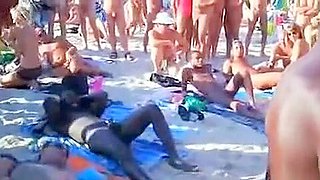 Swingers recorded by voyeur beach sex