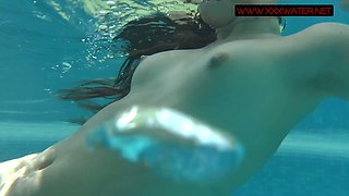 Russian mermaid Mia Ferrari performs hot underwater striptease show