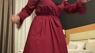 Fatima dancing in hotel room