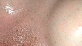 Big cock masturbates over my fake pierced tits and I suck him off