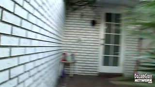 Sexy dark haired plays with her vulva in outdoor douche