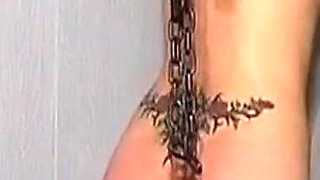 Chained Mature Brunette MILF Flogged by Dominant Master
