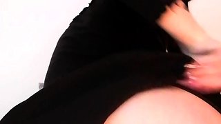 Amateur brunette cougar MILF jerking a giant dick