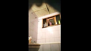 latina stepsister spied in the bathroom