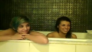 Two mesmerizing emo babes expose their gorgeous bums in the bathroom