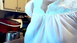 Mature woman in transparent granny night gown, natural tits