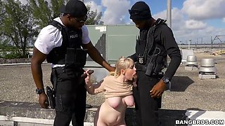 Watch Busty Kiki Parker Get Pounded by Black Cop in a Wild Interracial Threesome