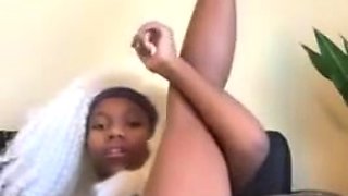 Geeky Ebony Girl Stuffing A Dildo In Her Pussy