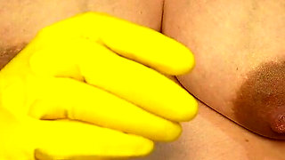 Indian Pregnant Stepsister in Yellow Gloves Plays with a Dildo and Talks Dirty