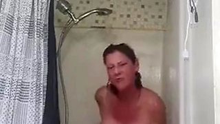 Take a long hot shower with a sexy real amateur MILF while I masturbate and squirt