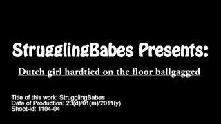 Dutch Girl Hardtied on the Floor Ballgagged