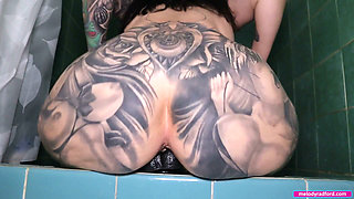 Tattooed MILF Fucks Black Dildo