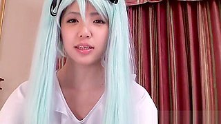 Japanese bluehaired cosplay babe enjoys sucking black cock