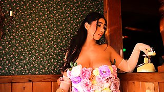 Flower covered latina reveals her pussy