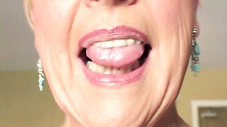 An awesome blonde GILF Jewel gives this young man a good head