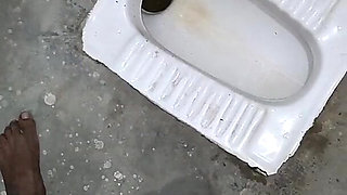 Desi Bhabhi Holding Stepbrother-in-law's Penis and Making Him Pee and Peeing Herself