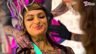 Anuskatzz, Miss Medea Mortelle, and Yazmin Aziz Share Spit and Big Dildos in Double Latex Domination