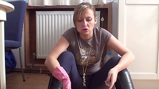 Dominant blonde teen crushes with her boots in femdom foot fetish scene
