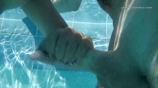 Horny bitch in swim glasses Candy gets fucked from behind in the pool