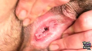 Older mature mom gaping pussy then stuffing her hairy pussy