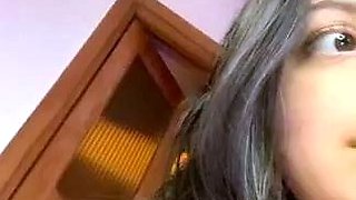Brunette with big boobs teasing on webcam