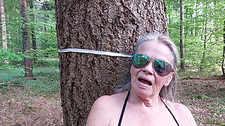 Granny Is Masturbating in the Woods!