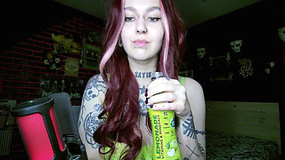 Sexy Alternative Redhead Drinking Soda and Burping
